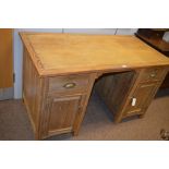Pitch pine kneehole desk.
