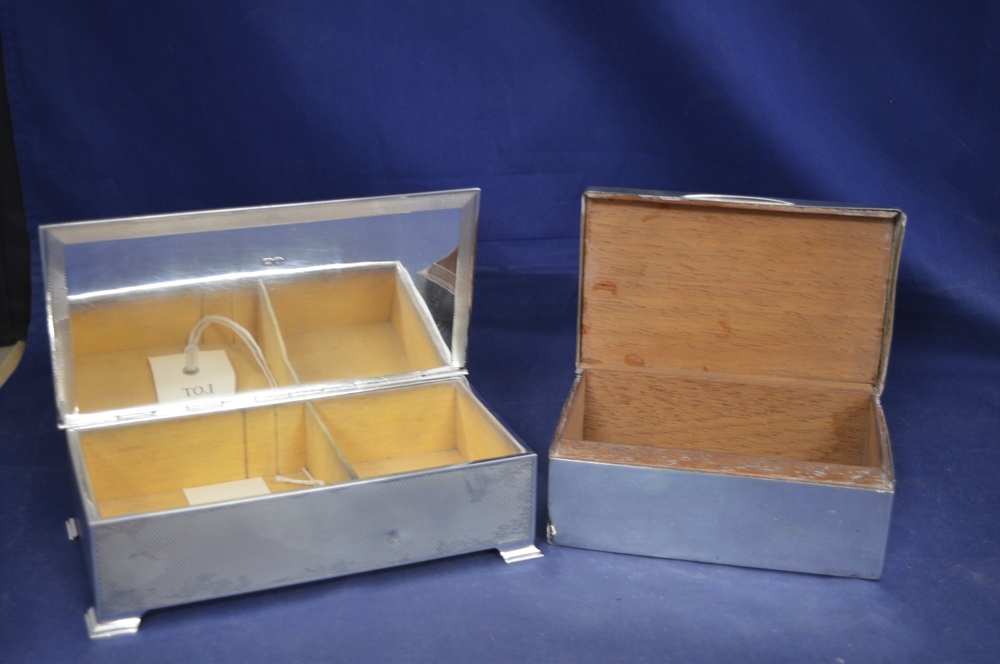 Two silver cigarette cases