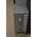 A metal filing cabinet.