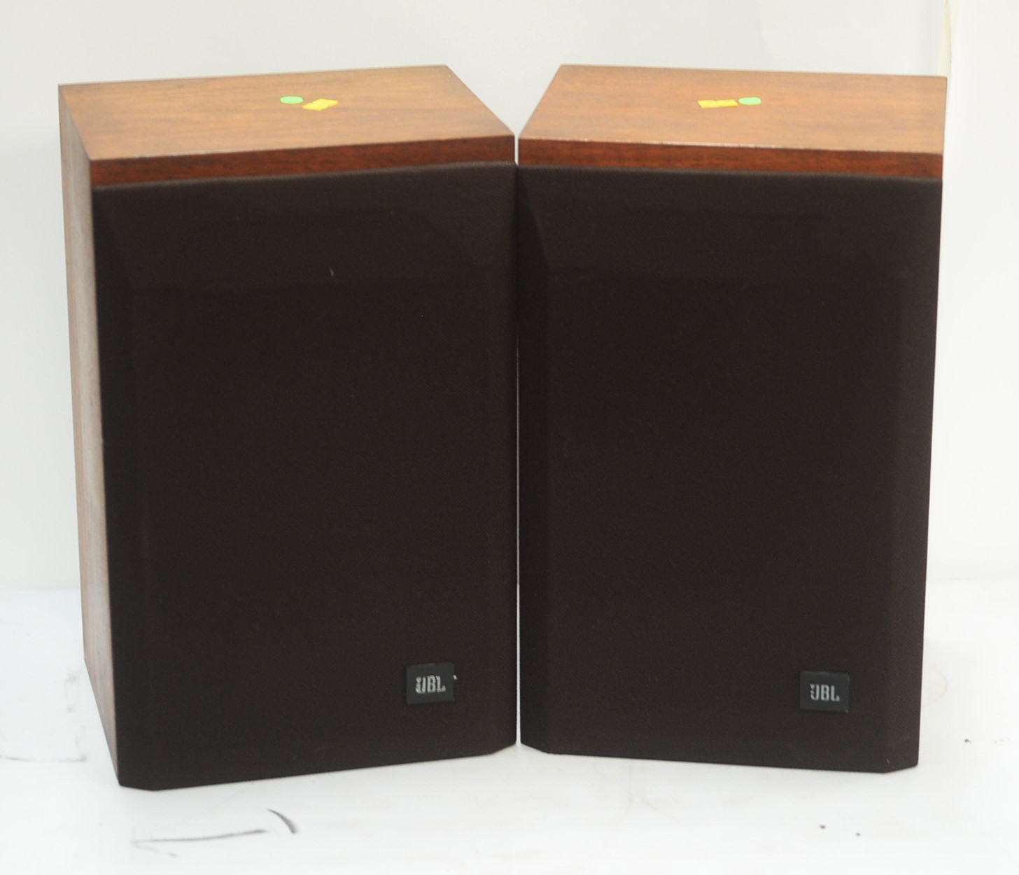 A pair of JBL L15 speakers