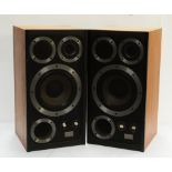 A pair of Wharfedale E Fifty floor standing speakers.