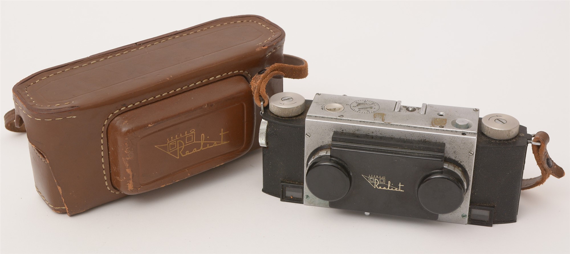 A Realist 35mm stereo camera and lenses.