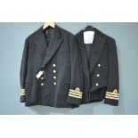Two Royal Navy Reserves uniforms