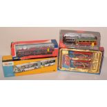Die-cast model buses by Corgi and Creative Master.
