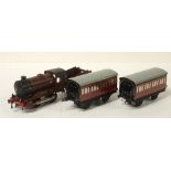 An 0-gauge clockwork 0-4-0 locomotive, tender and two tinplate coaches by Hornby