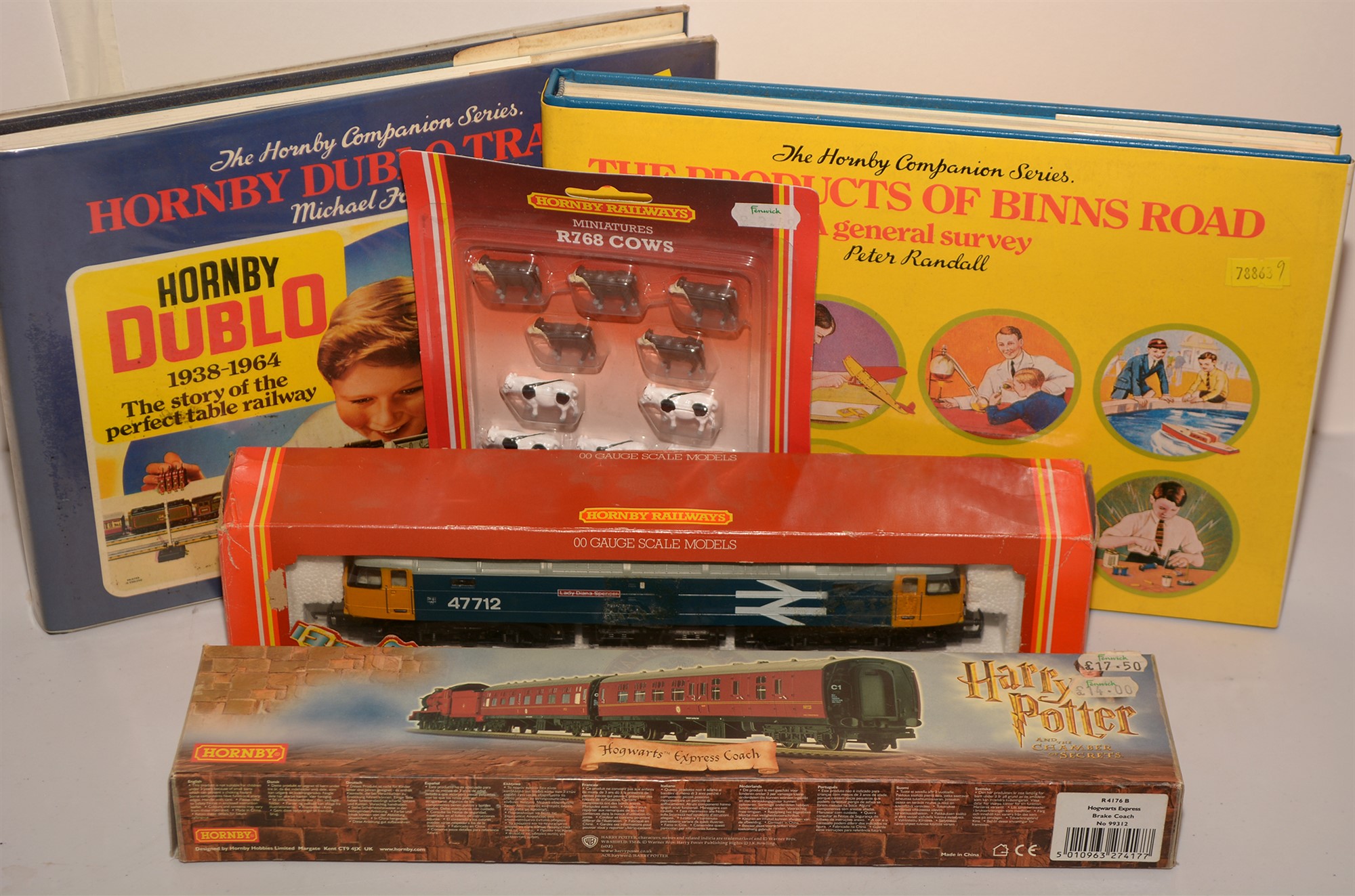 Hornby locomotive, Hogwarts coach; and two books on Hornby products.