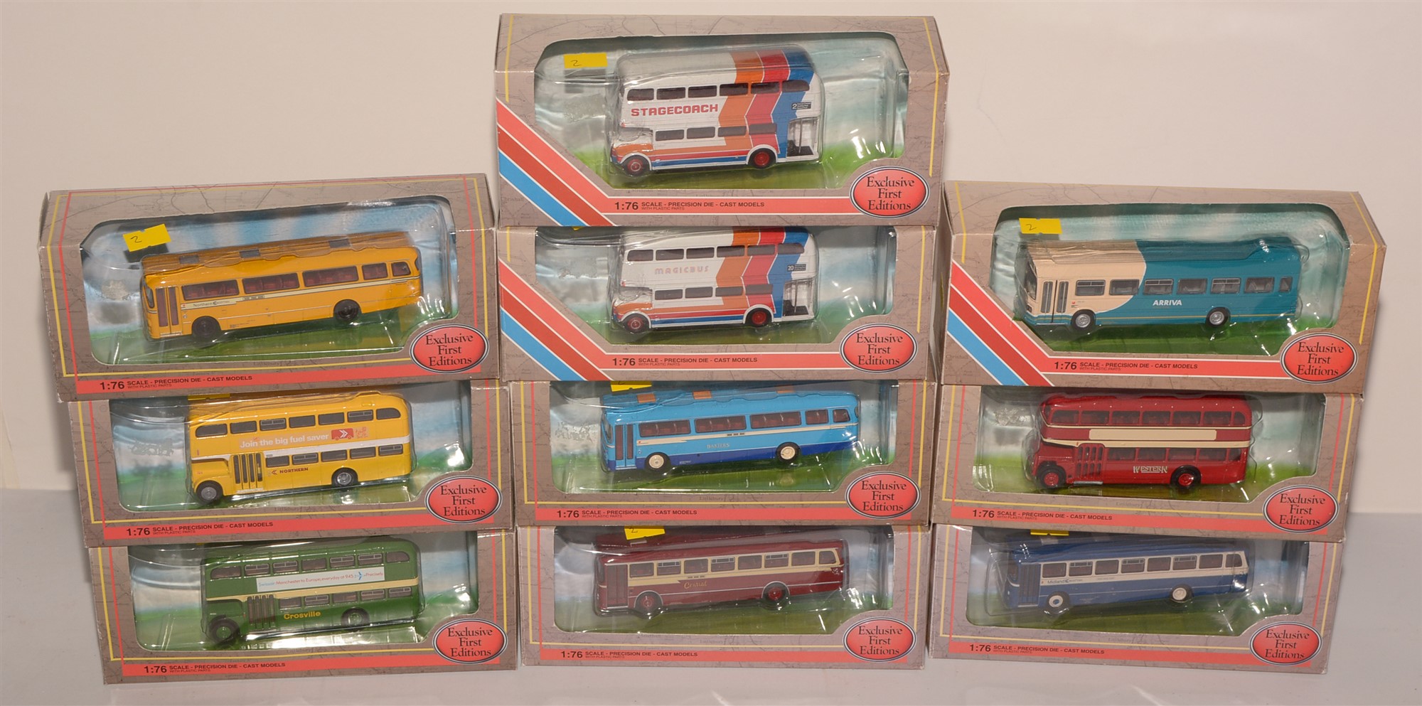 Die-cast model buses by Exclusive First Editions.