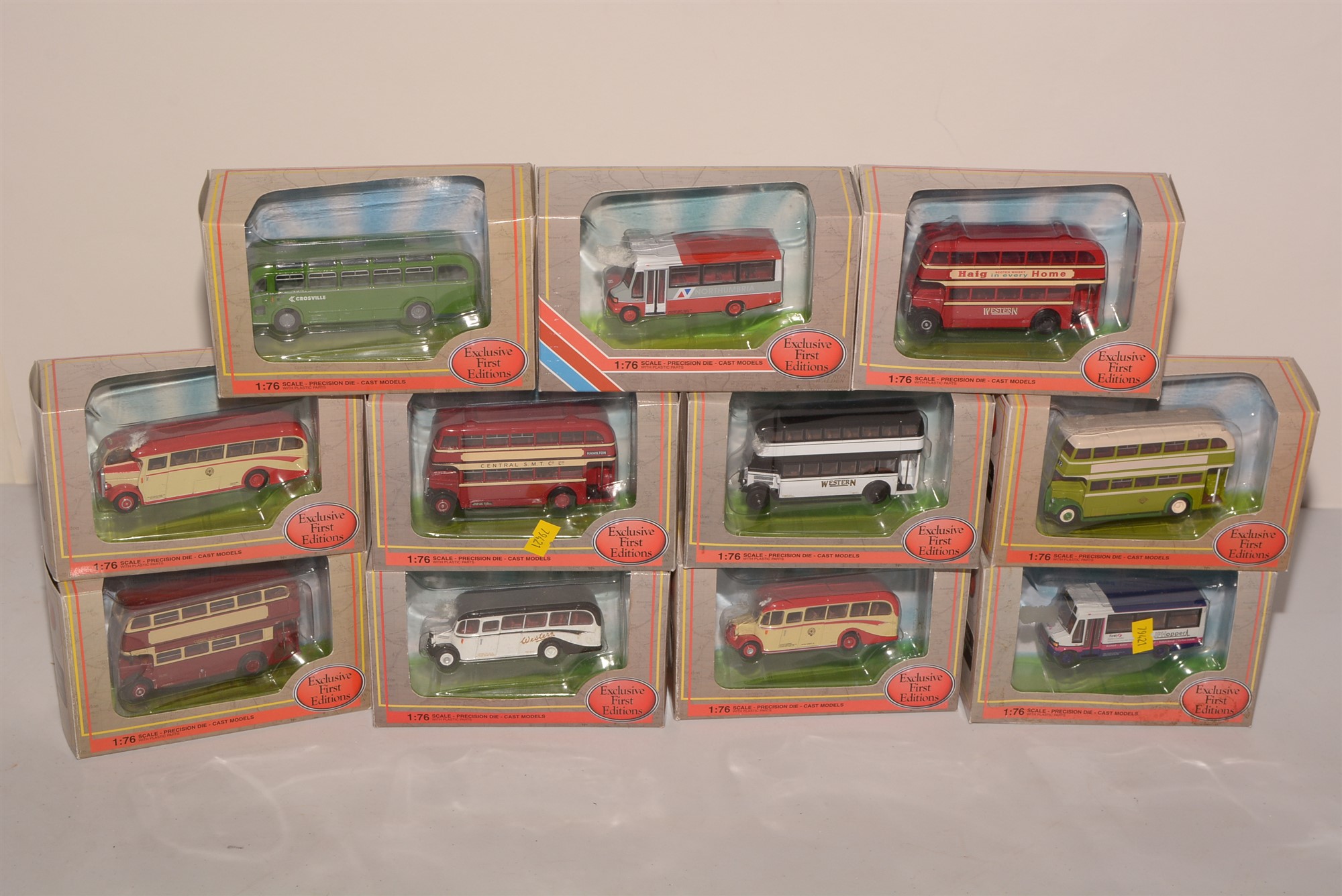 Die-cast model buses by Exclusive First Editions.