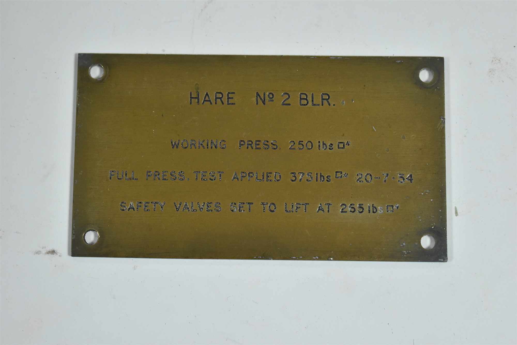 Boiler pressure test plate.