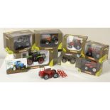 Die-cast model tractors.