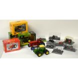 Die-cast model tractors.