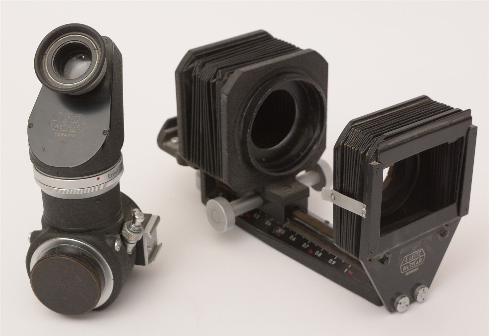 Leica viewfinder and close-up bellows attachments.