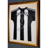 A Newcastle United facsimile football shirt, No. 9.