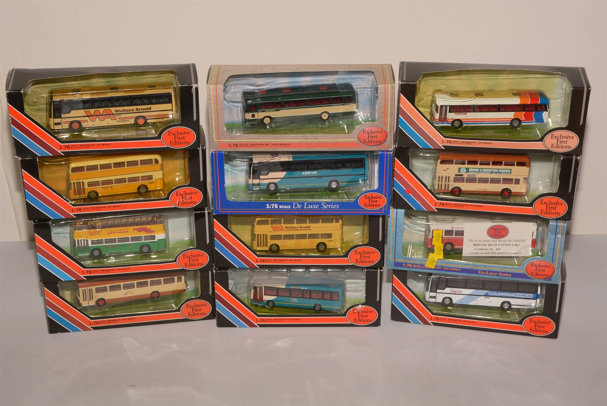 Die-cast model buses by Exclusive First Editions.