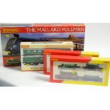 Hornby train set; railcar set; and two goods train sets.