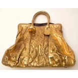 Zagliani: A gold coloured simulated reptile skin puffy soft hand bag, violet suede interior, 45cms