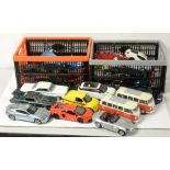 Die-cast model vehicles by Welly and Burago.