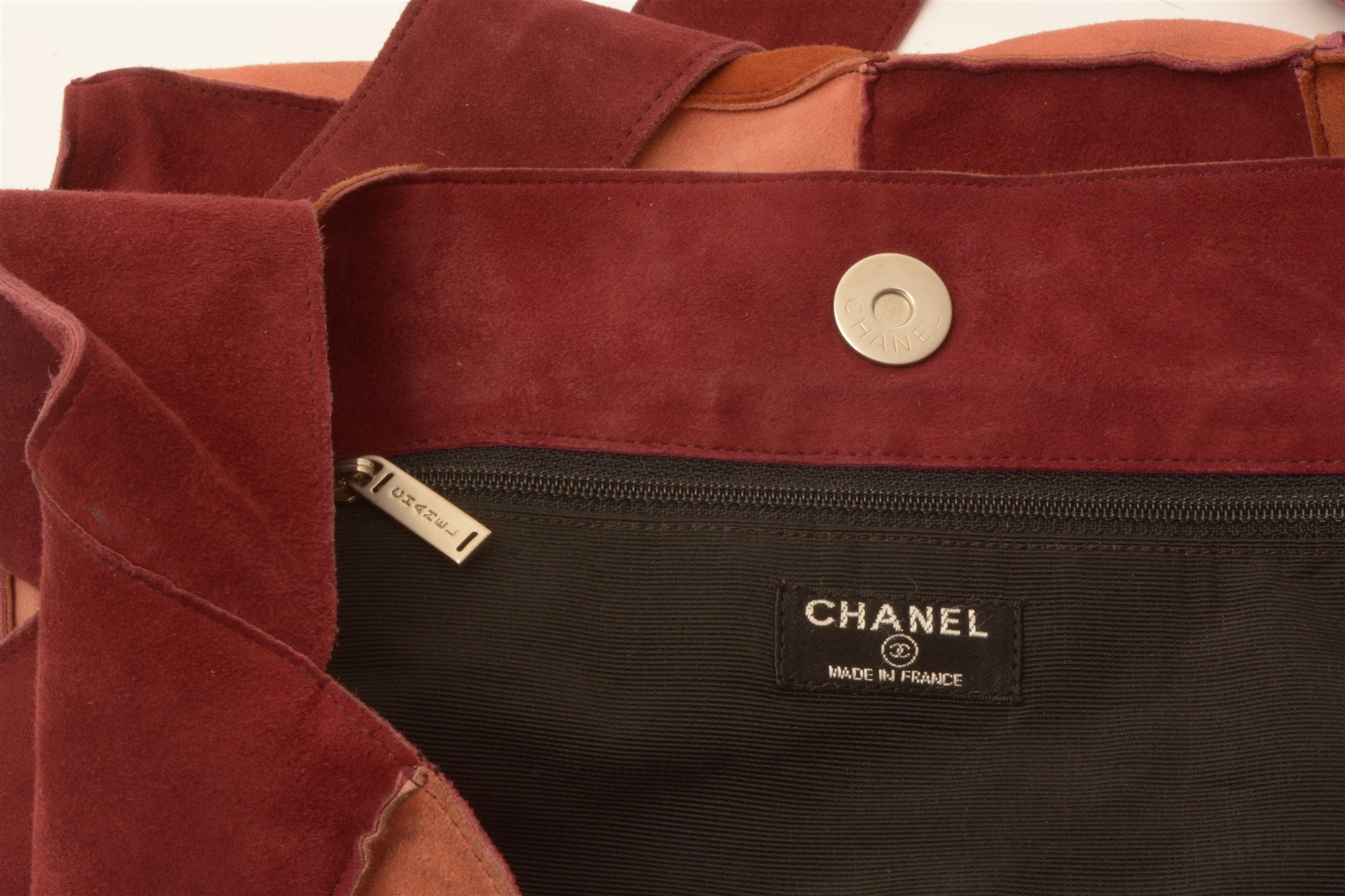 Chanel: A suede hand bag, in claret, brown and flesh colours, with serial in inside corner - Image 3 of 3