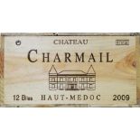 Twelve bottles of Chateau Charmail.