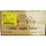 Twelve bottles of Chateau Lagrange Pomerol.