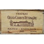 Twelve bottles of Chateau Grand Corbin Despagne.