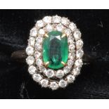 Emerald and diamond cluster ring