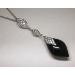 Onyx and diamond pendant
