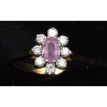 Pink sapphire and diamond ring