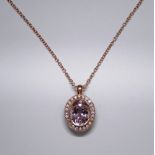 Morganite and diamond cluster pendant