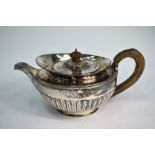 A Regency silver half-reeded teapot with raised upper rim, Thomas Ellerton & Richard Sibley I,