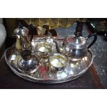 An epns oval galleried tray, to/w a three-piece tea service, chocolate pot, cream jug and tea
