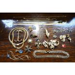 A quantity of vintage and later gilt metal jewellery including necklaces, bracelets, brooches etc