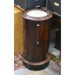 A circular mahogany marble top pot cupboard with single door