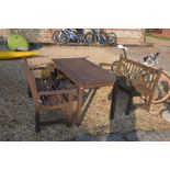 Stained teak rectangular garden dining table to/w a pair of teak benches
