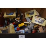 A box of die-cast model vehicles to include seven boxed Models of Yesteryear, pair of bookends