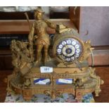 A French gilt metal mantel clock surmounted by 18th century figure, with ceramic floral painted drum