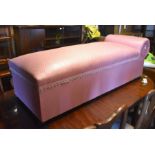 A scroll end box seated  chaise/ottoman, pink upholstery