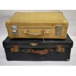 A cream vellum Globetrotter suitcase and a larger blue vintage suitcase (2)
