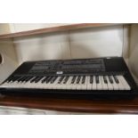 A Technics digital keyboard, model no. SX-K500, c/w stand