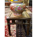 A Chinese famille rose oviform vase with gilt swallow handles, decorated with a Dragon and