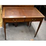 Edwardian inlaid mahogany writing table with two frieze drawers raised on square tapering supports