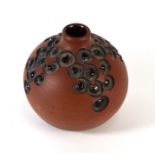 Poole Pottery Atlantis red body globular vase, shape A5/1, thrown, carved and decorated by Catherine