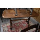 Victorian library console table with rounded rectangular top on twin trestle supports united by a