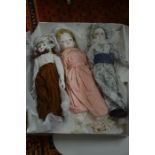 Three porcelain headed collector's dolls