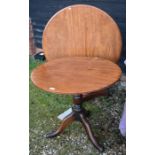 A 19th century mahogany tilt top breakfast table on tapering octagonal column and triform base to/