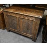 A small carved oak coffer