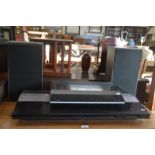A Bang & Olufsen Beocenter 2200 and a Beogram CD 4500 with speakers