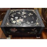 A modern Chinese rectangular Chest decorated with natural history designs and metal fittings