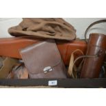 A collection of leather game sporting leather cases to include- leg-o-mutton case, cylindrical case,