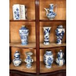 Nine pieces of Asian blue and white porcelain, including: a Transitional style gu-shaped beaker vase